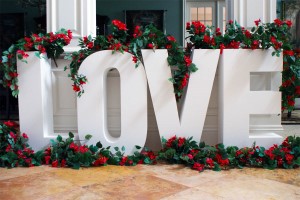 Large LOVE letters with red flower garland