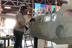 Grumman Goose Seaplane fiberglass being sanded and prepped for paint