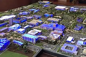 Movie prop of BYU campus diorama lit blue